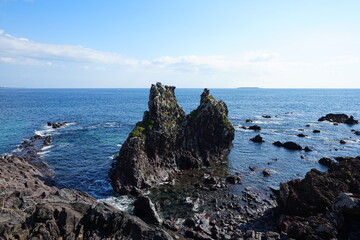 fine rock coast and clear blue sea