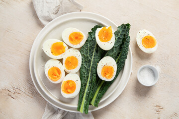 Plate with halves of delicious boiled eggs.