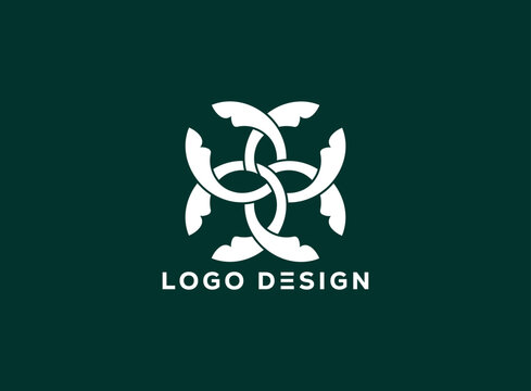 Elegant abstract C letter logo design with interlocking curved elements forming a floral emblem on dark green background, ideal for luxury branding and organic identity