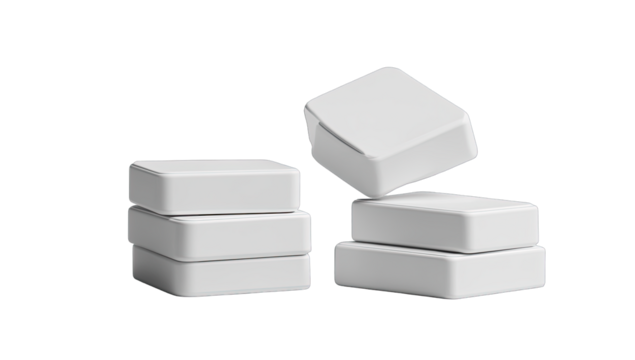 Three stacks of white, square, geometric blocks