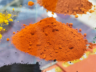 Vibrant color pigment powders create a stunning array for artistic and industrial coatings in a...