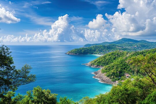 Scenic coastline of Phuket Island with clear waters and stunning cloud formations under a blue sky, Phuket island Thailand sea coast landscape Scenic getaway location