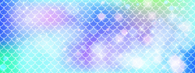 Mermaid scale pattern with soft gradients.  Rainbow background with seamless fish or dragon tail texture. Blue decorative layout in vector format.