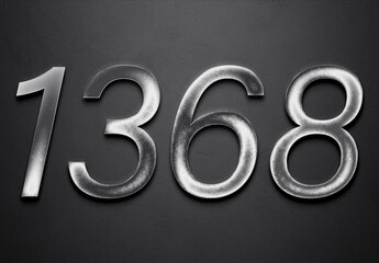Chrome metal 3D number design of 1368 on grey background.
