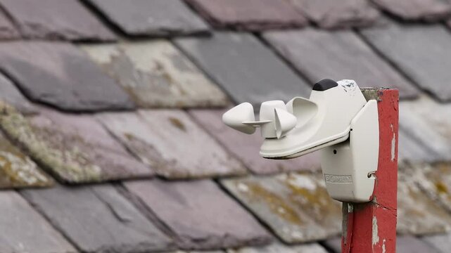 Rooftop Anemometer Against Tiled Background