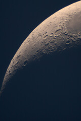 High-resolution view shows rugged lunar crescent crater landscape. High-Resolution Close-Up of the Moon's Terminator Line with Craters