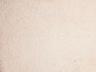 Beige carpet texture provides a soft and comforting background