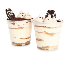 Plastic cups with delicious tiramisu for Halloween celebration on white background