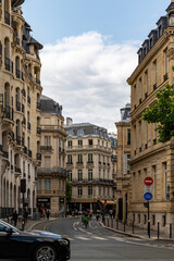 Obraz premium Street View of Buildings and Traffic in Paris