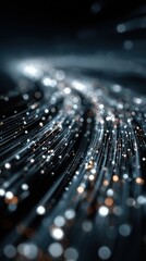 Close-up of illuminated fiber optic cables with a bokeh effect
