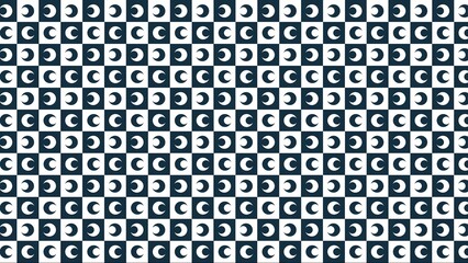 A checkerboard pattern with alternating squares of moons in black and white arrangement visible