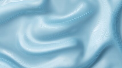 Naklejka premium Close-up of a smooth, light blue cream with swirling patterns