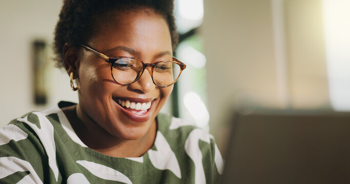 Fototapeta Happy, woman and online with laptop, home and review of financial report on website and remote work. Freelancer, smile and black person with tech for bookkeeping, read and typing of info in house