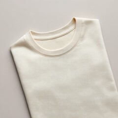 Soft Beige T-Shirt Fabric Laid Flat on Neutral Background