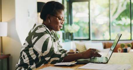 Black woman, finance or laptop with research for budget planning, accounting or calculation at...