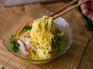 egg noodles with wonton roasted pork and crispy pork.