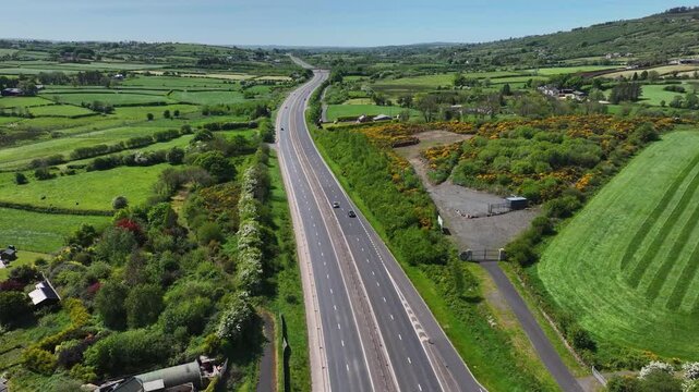 Aerial view of vehicles driving on A8 Larne road Dual carriageway, Ballymena road, Belfast road, Millbrook Larne Co Antrim Northern Ireland