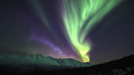Vibrant green and purple aurora dancing over snowy peaks, a celestial spectacle of nature's magic.
