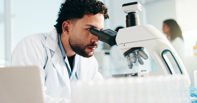 Man, scientist and microscope for medical study, research or forensic science at laboratory. Male person, healthcare worker or exam with microorganisms for new discovery, analysis or investigation