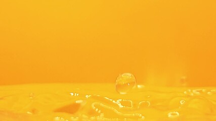 Water-Drop Background, Abstract Background,  Drops of water falling into water in slow motion close-up. - Powered by Adobe