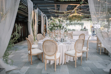 lovely Table setting for magnificent composition from flowers at a wedding