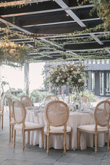 lovely Table setting for magnificent composition from flowers at a wedding