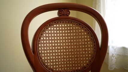 Vintage Chair Close Up Revealing Classic Woven Back Design Style