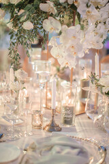 lovely Table setting for magnificent composition from flowers at a wedding