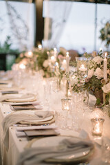 lovely Table setting for magnificent composition from flowers at a wedding