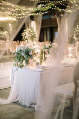 lovely Table setting for magnificent composition from flowers at a wedding