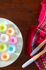 A close-up of Floral rice cakes on the wooden table.