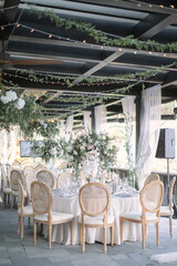 lovely Table setting for magnificent composition from flowers at a wedding