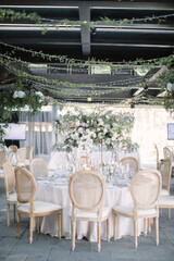 lovely Table setting for magnificent composition from flowers at a wedding