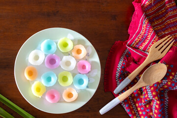 A close-up of Floral rice cakes on the wooden table.
