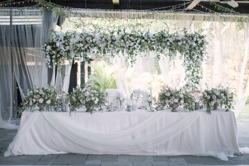 lovely Table setting for magnificent composition from flowers at a wedding