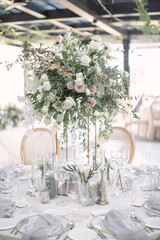 lovely Table setting for magnificent composition from flowers at a wedding