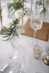 lovely Table setting for magnificent composition from flowers at a wedding