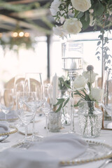 lovely Table setting for magnificent composition from flowers at a wedding