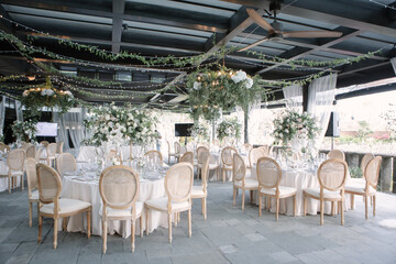 lovely Table setting for magnificent composition from flowers at a wedding