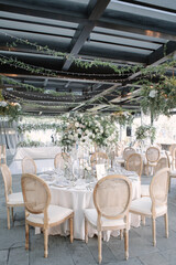 lovely Table setting for magnificent composition from flowers at a wedding