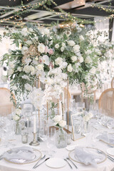 lovely Table setting for magnificent composition from flowers at a wedding