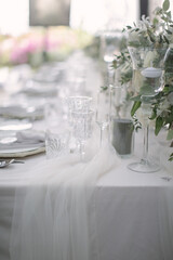lovely Table setting for magnificent composition from flowers at a wedding , Centerpiece white and orange color palette flower bouquet arrangement