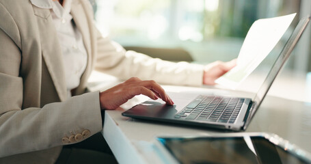 Obraz na płótnie Canvas Hands, business woman and laptop with document for typing, comparison and accounting. Accountant, paperwork and person with technology for data entry, finance management and revenue growth in office