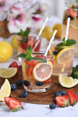 Lemonade with strawberries, blueberries and mint. Perfect for a hot summer day