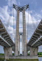 Fototapeta premium Gustave Flaubert vertical-lift Bridge spanning the Seine river in Rouen, Normandy, France 