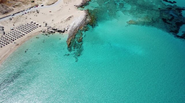 Aerial top view Falassarna beach in Crete, Greece, Falassarna beach is a very famous tourist destination in Crete, 4k aerial view beach. Famous Falasarna (also known as Falassarna or Phalasarna).