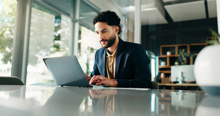 Laptop, reading and businessman in office with research for investment proposal with client email. Professional, happy and male finance manager with computer for company budget planning in workplace.
