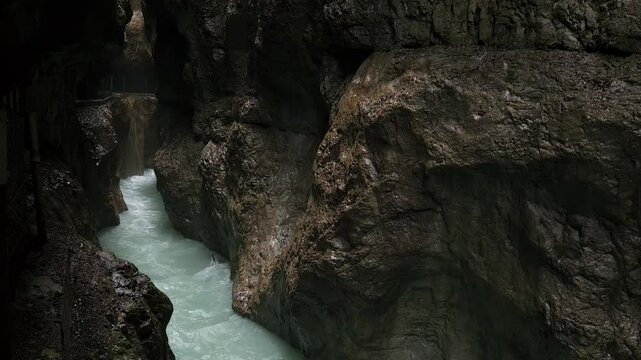 Water running through Partnach gorge in Bavaria Germany during summer season.