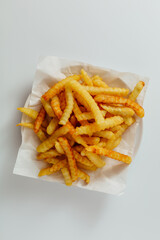 Crispy Golden French Fries on White Background for Food Photography