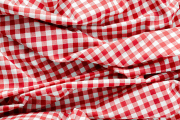 Red and White Checkered Fabric Pattern With Pleats and Creases